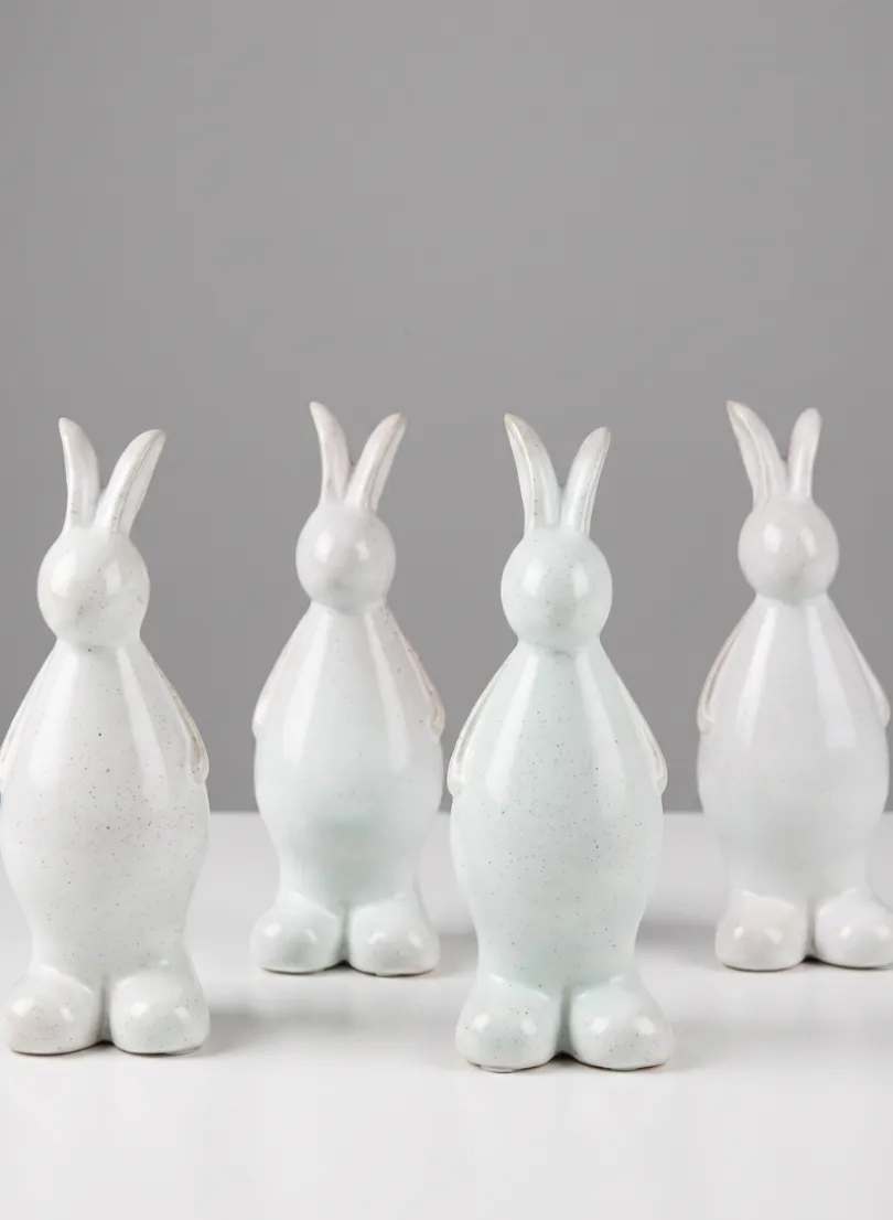 7.5in Tall Aged White Porcelain Rabbit, Set of 4