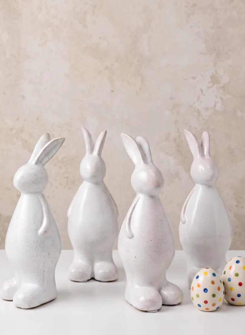 7.5in Tall Aged White Porcelain Rabbit, Set of 4