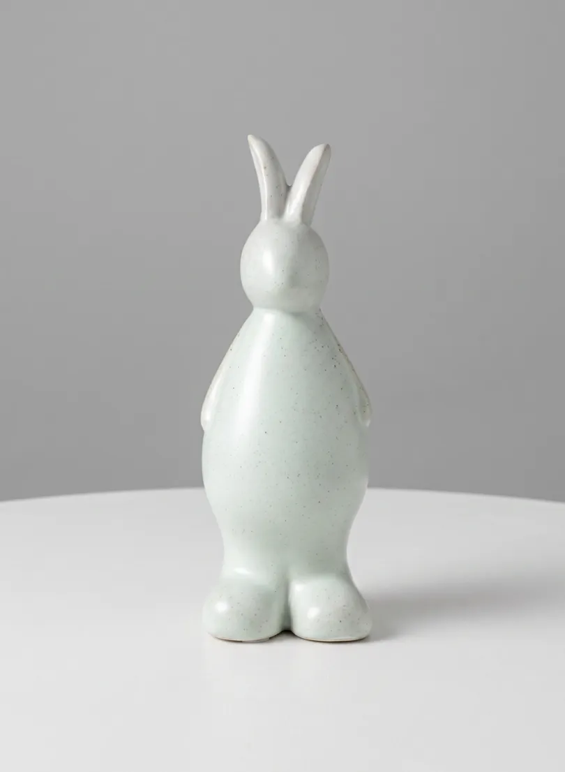 7.5in Tall Aged White Porcelain Rabbit, Set of 4